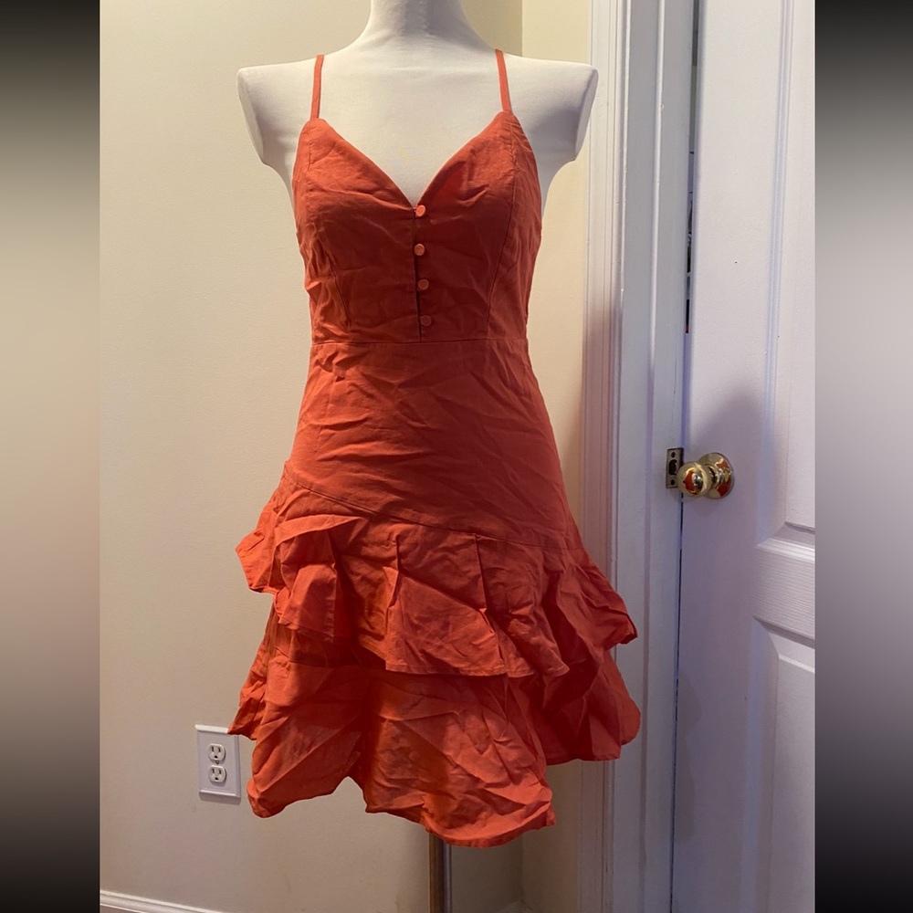 Spaghetti strap dress. Orange. Ruffles. Brand: Free People.